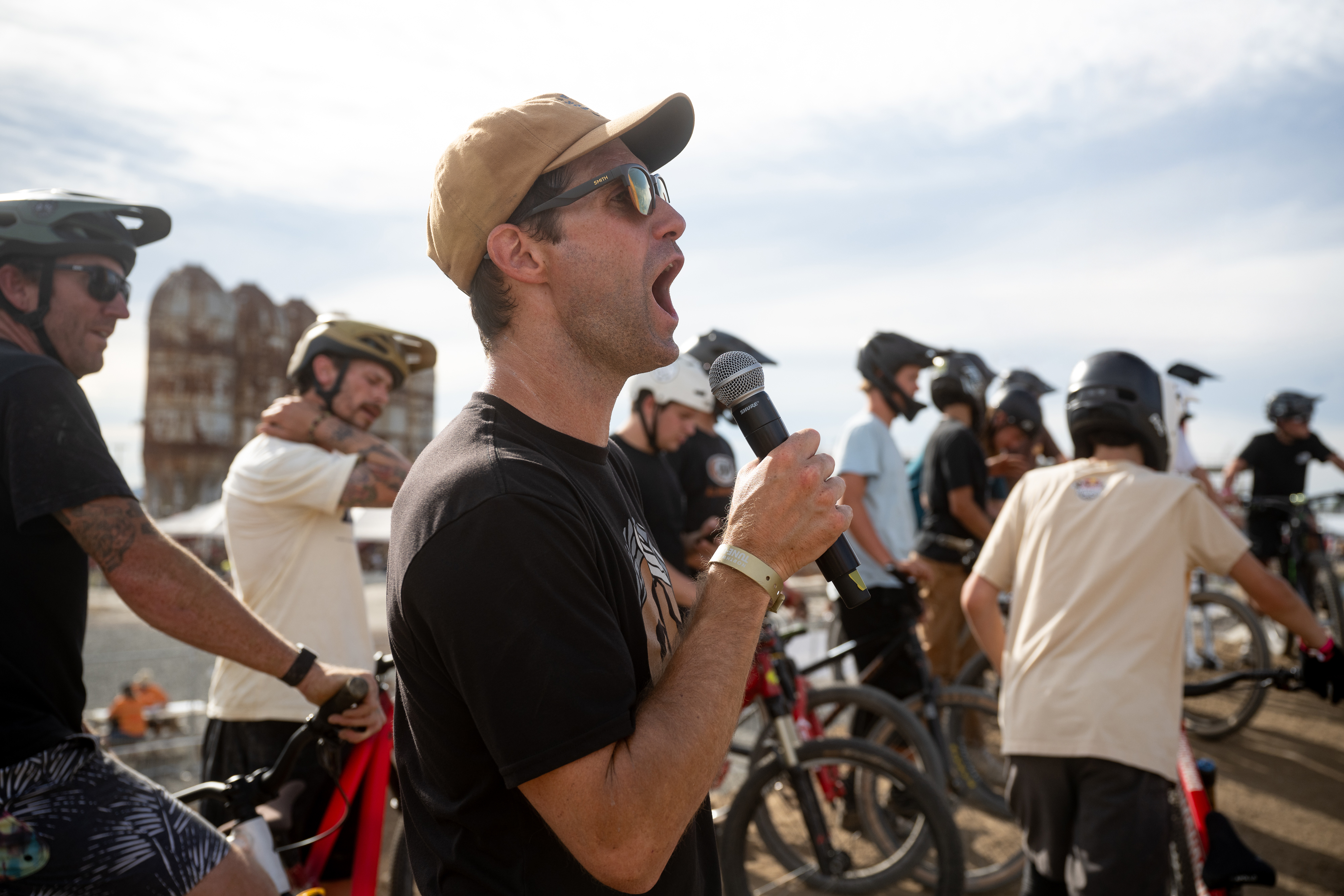 Cam McCaul emcees the Tune-Up dirt jump jam. Photo: Colin Wiseman.