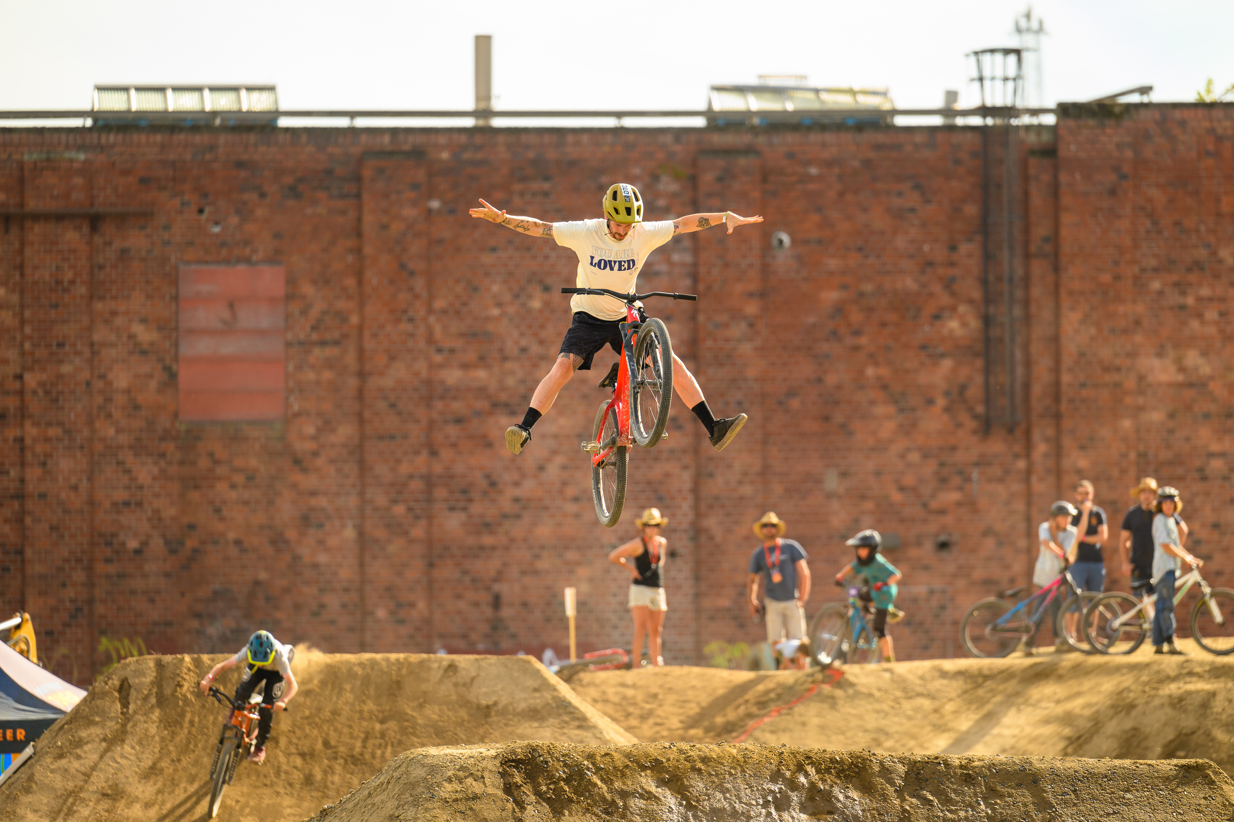 A biker goes big on a jump with a spread eagle. Photo: Eric Mickelson.
